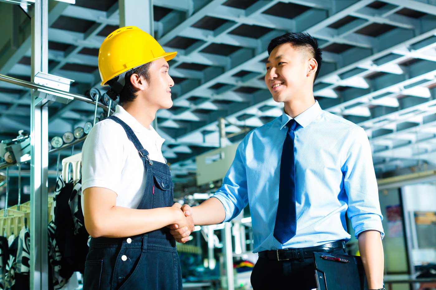 Industrial staff discussing support services at a facility